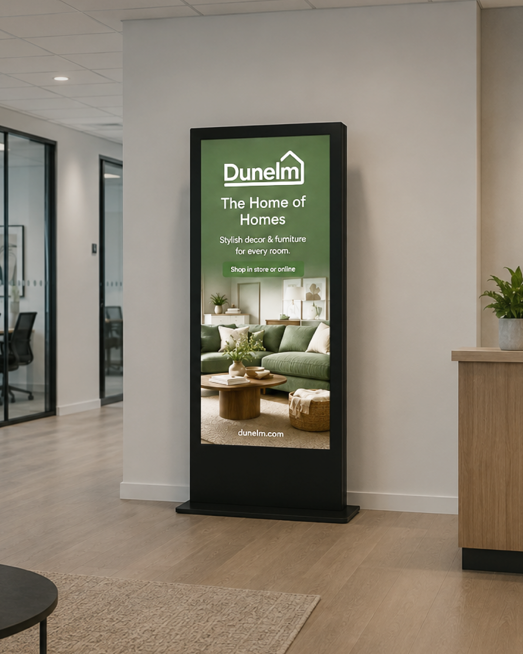 A Forma portrait screen in a modern office reception
